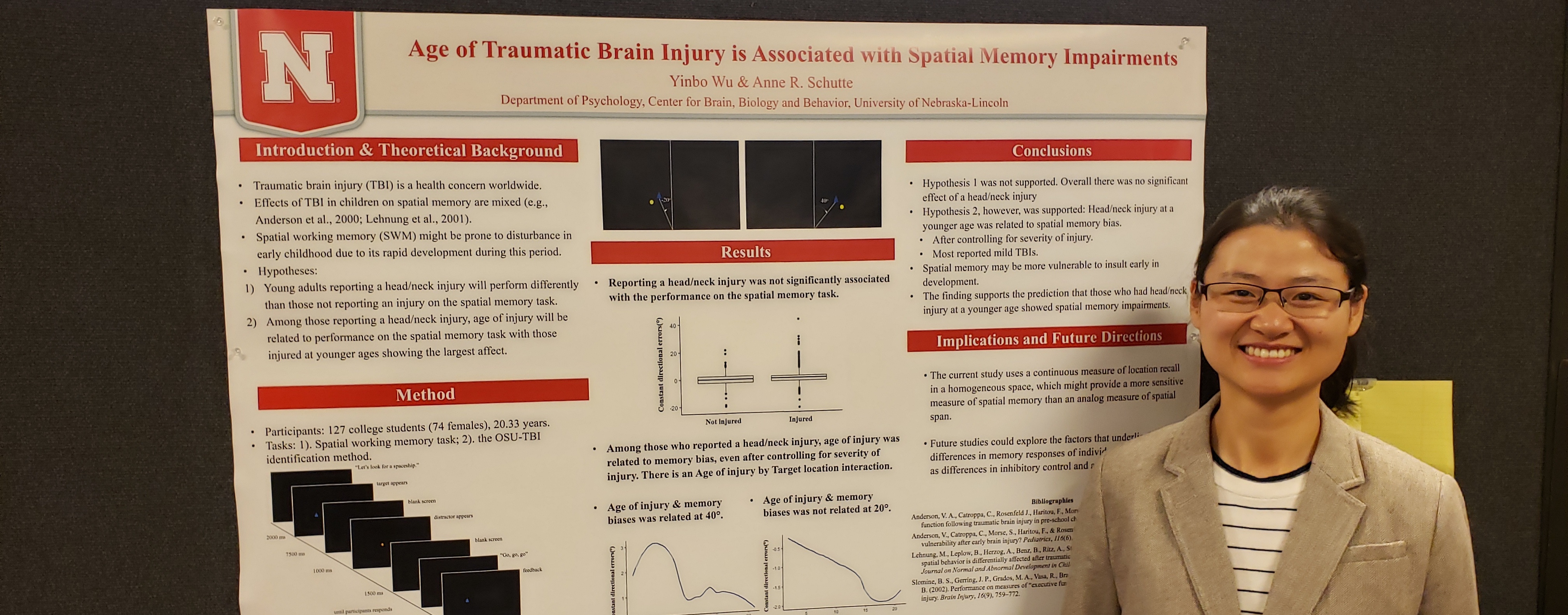 Graduate student presenting a poster